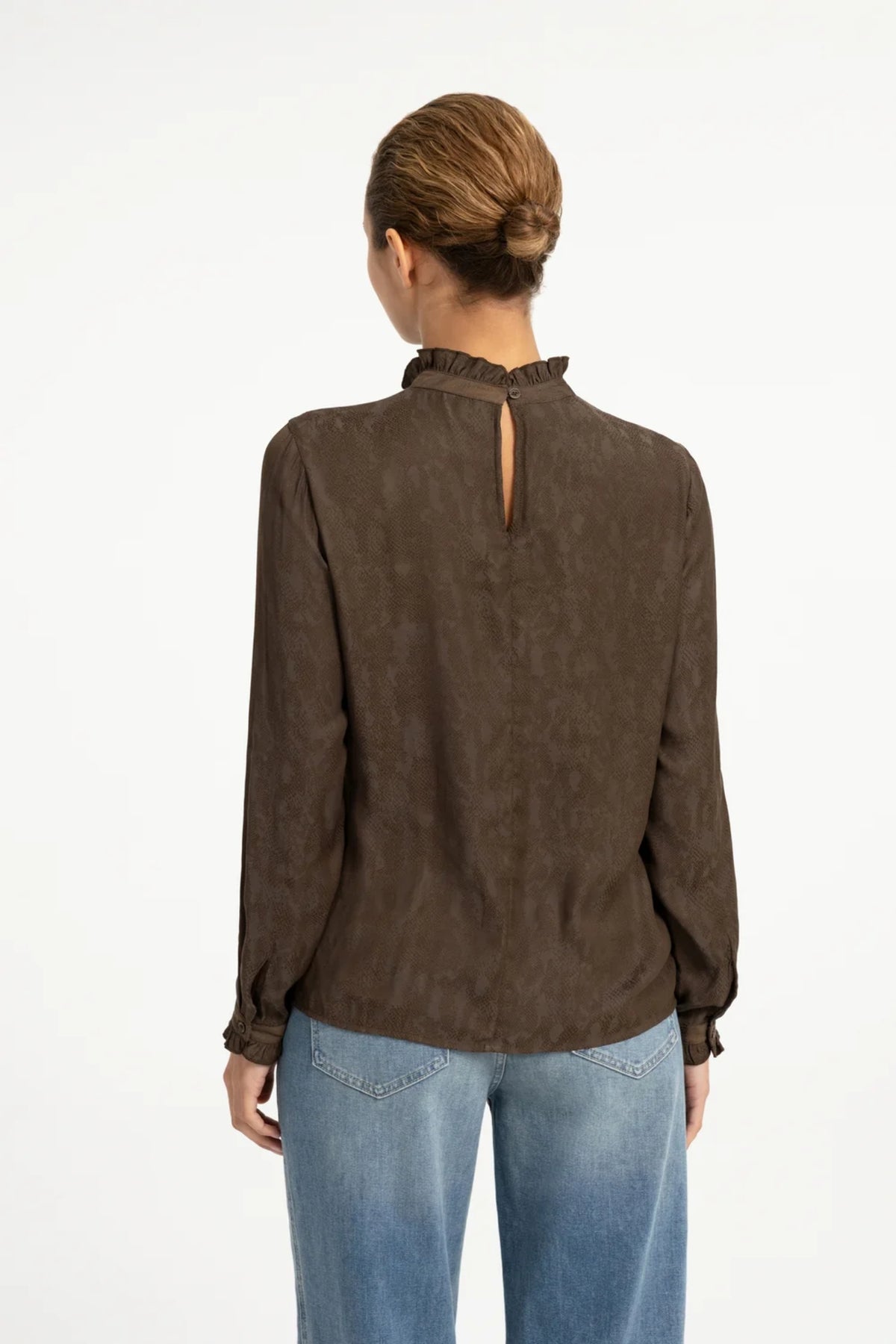Shop YAYA’s Long Sleeve Top with Ruffle Details in Slate Black Brown Dessin at Dotique. A textured top with delicate neckline and cuff ruffles.