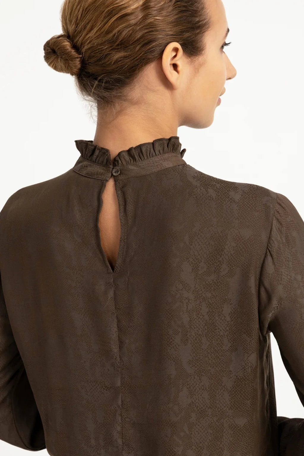 Shop YAYA’s Long Sleeve Top with Ruffle Details in Slate Black Brown Dessin at Dotique. A textured top with delicate neckline and cuff ruffles.