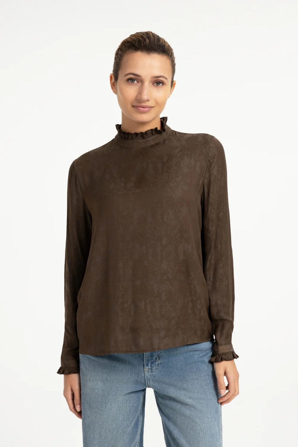 Shop YAYA’s Long Sleeve Top with Ruffle Details in Slate Black Brown Dessin at Dotique. A textured top with delicate neckline and cuff ruffles.